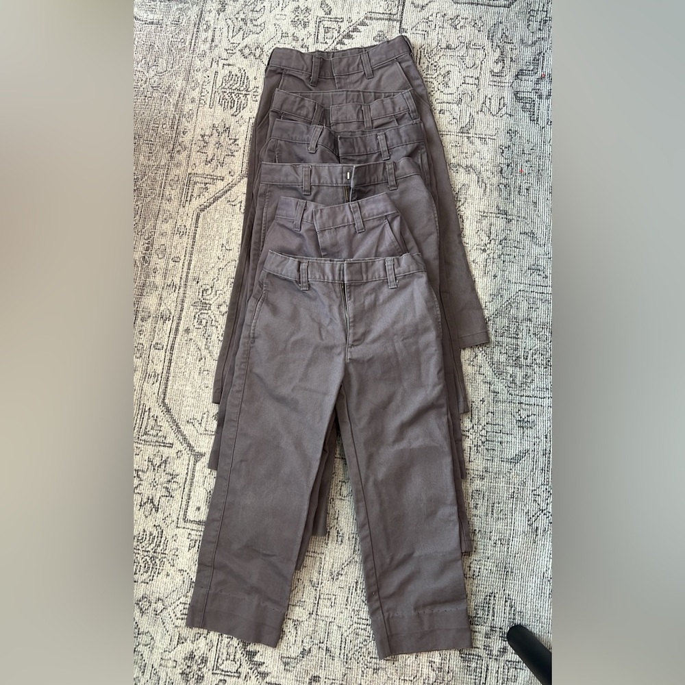 6 pairs of grey uniform pants, size 5